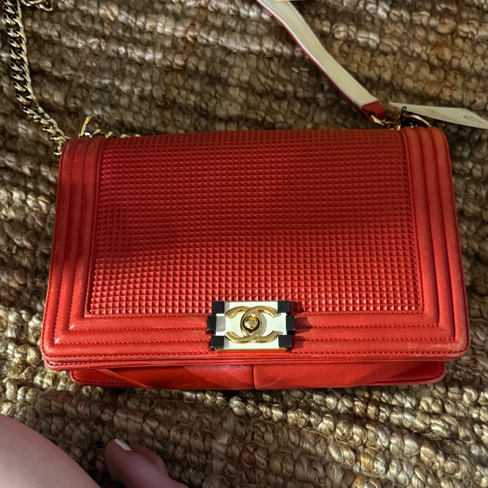 CHANEL Red Crossbody Bag with Gold Accents